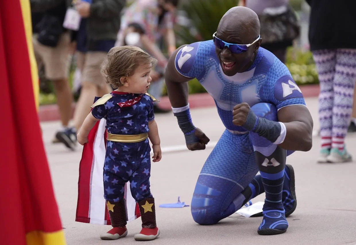 San Diego Comic-Con 2022 Man and Baby in costume